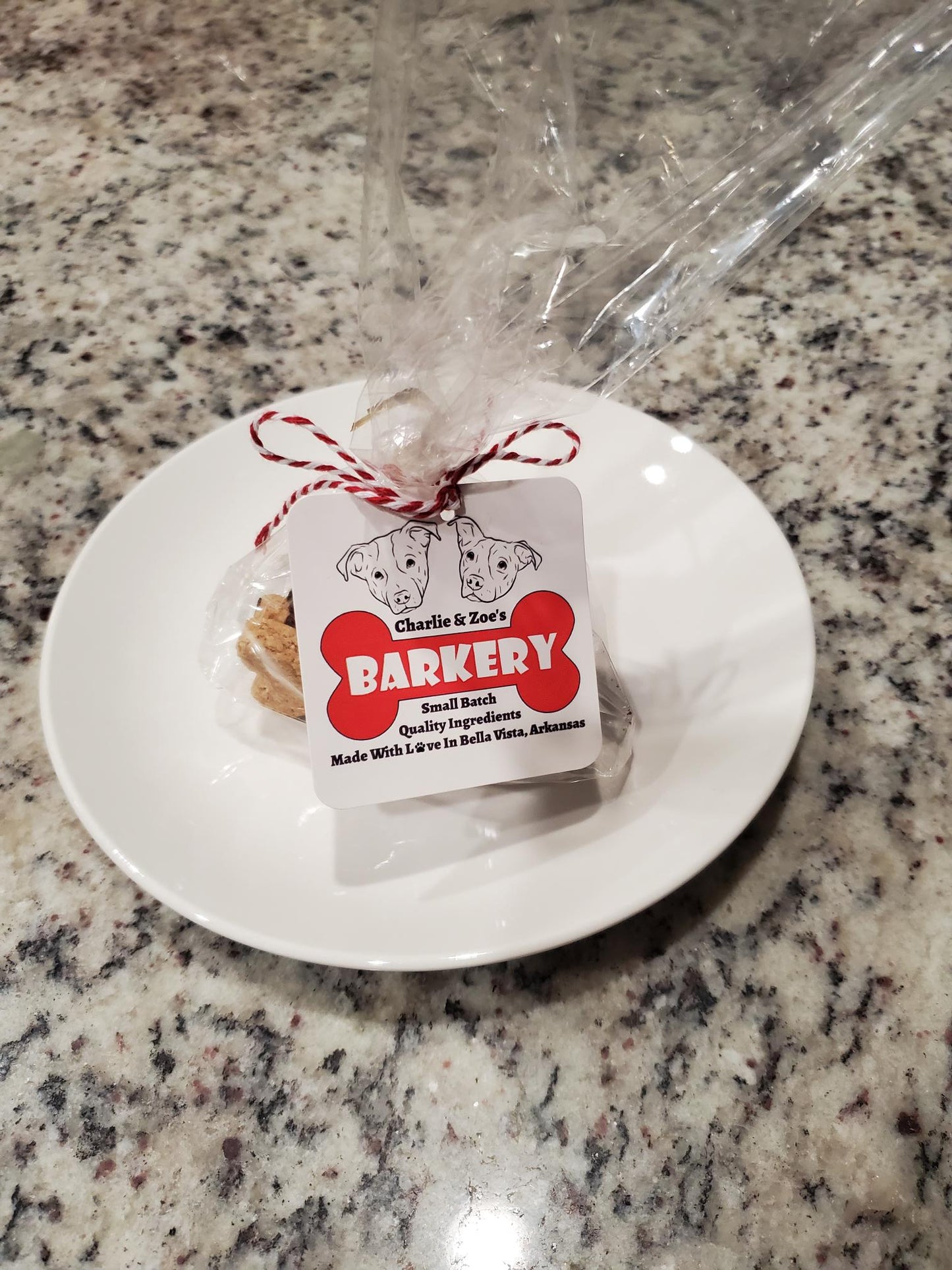 Dog treats in plastic bag with Charlie & Zoe's Barkery tag