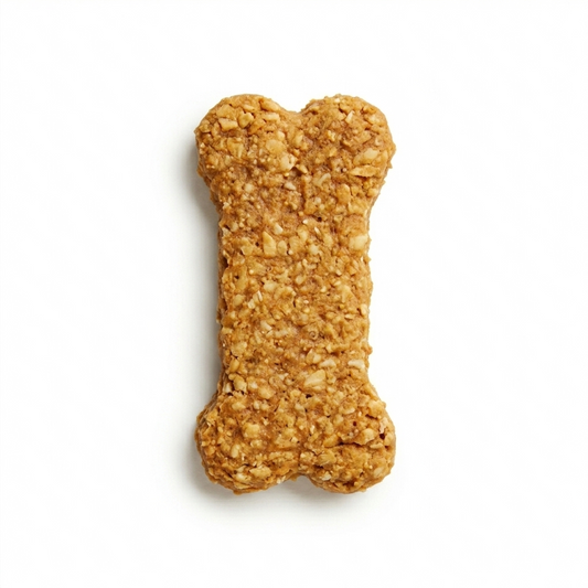 Dog bone-shaped treat on a white background